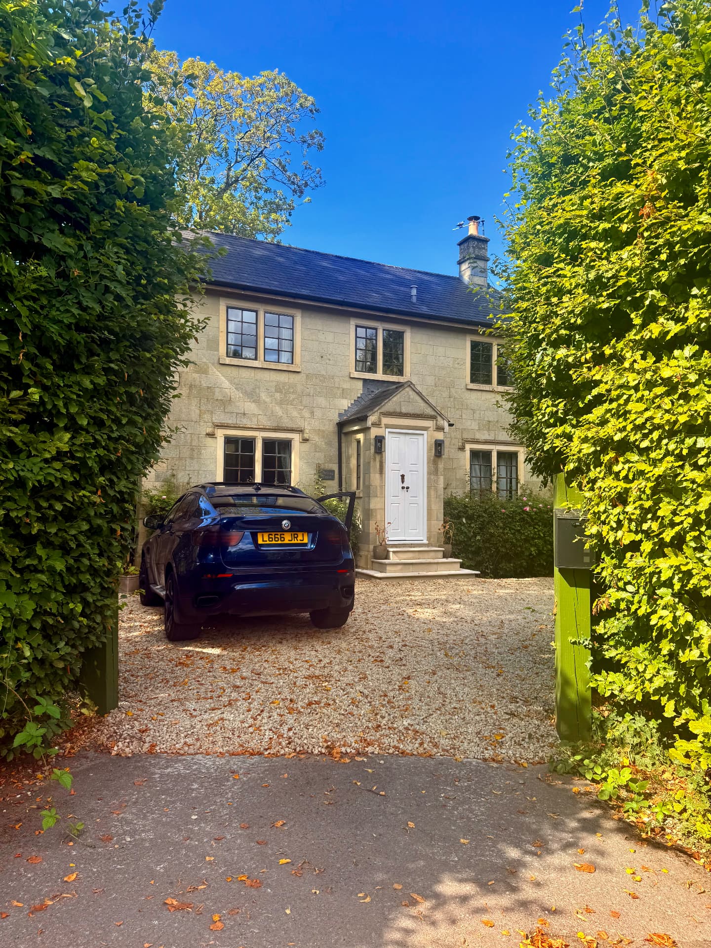 Gravel driveway leading to the house